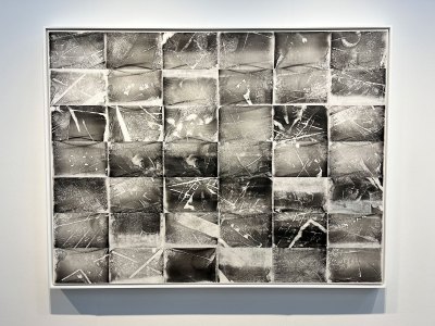 An artwork made of dozens of Xeroxs in gray.