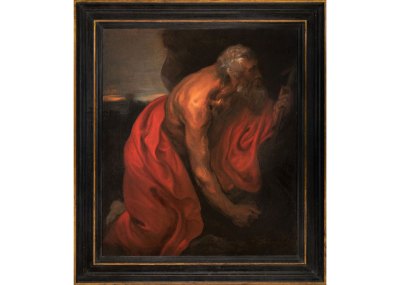 A portrait of St. Jerome as an elderly man who is shown close-up kneeling in a red robe.